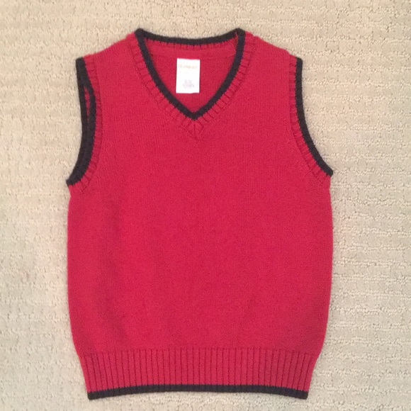 red sweater vest